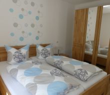Bett im Schlafzimmer in Ferienwohnung Diemeltal in Marsberg